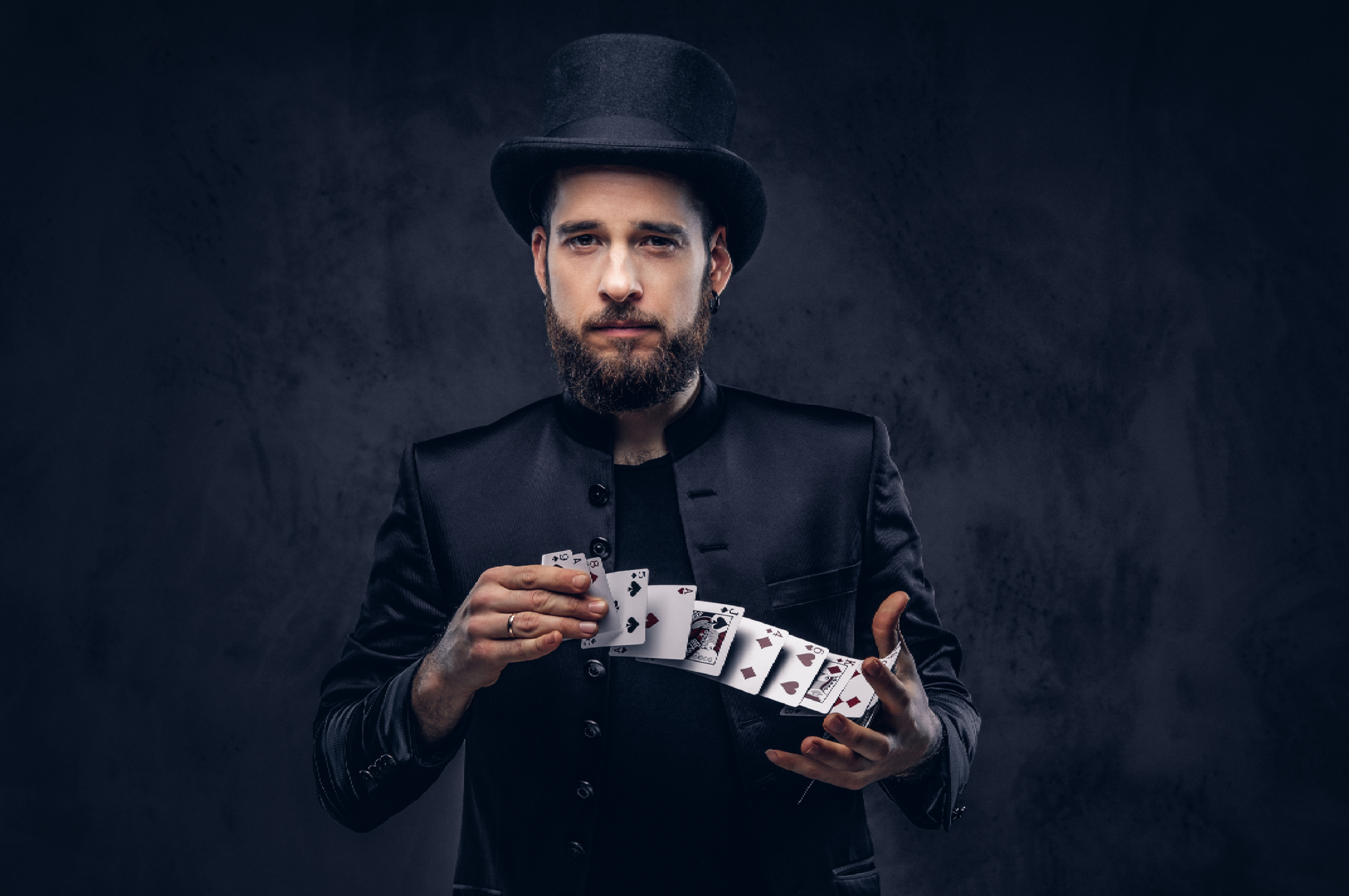 Man in top hat with playing cards