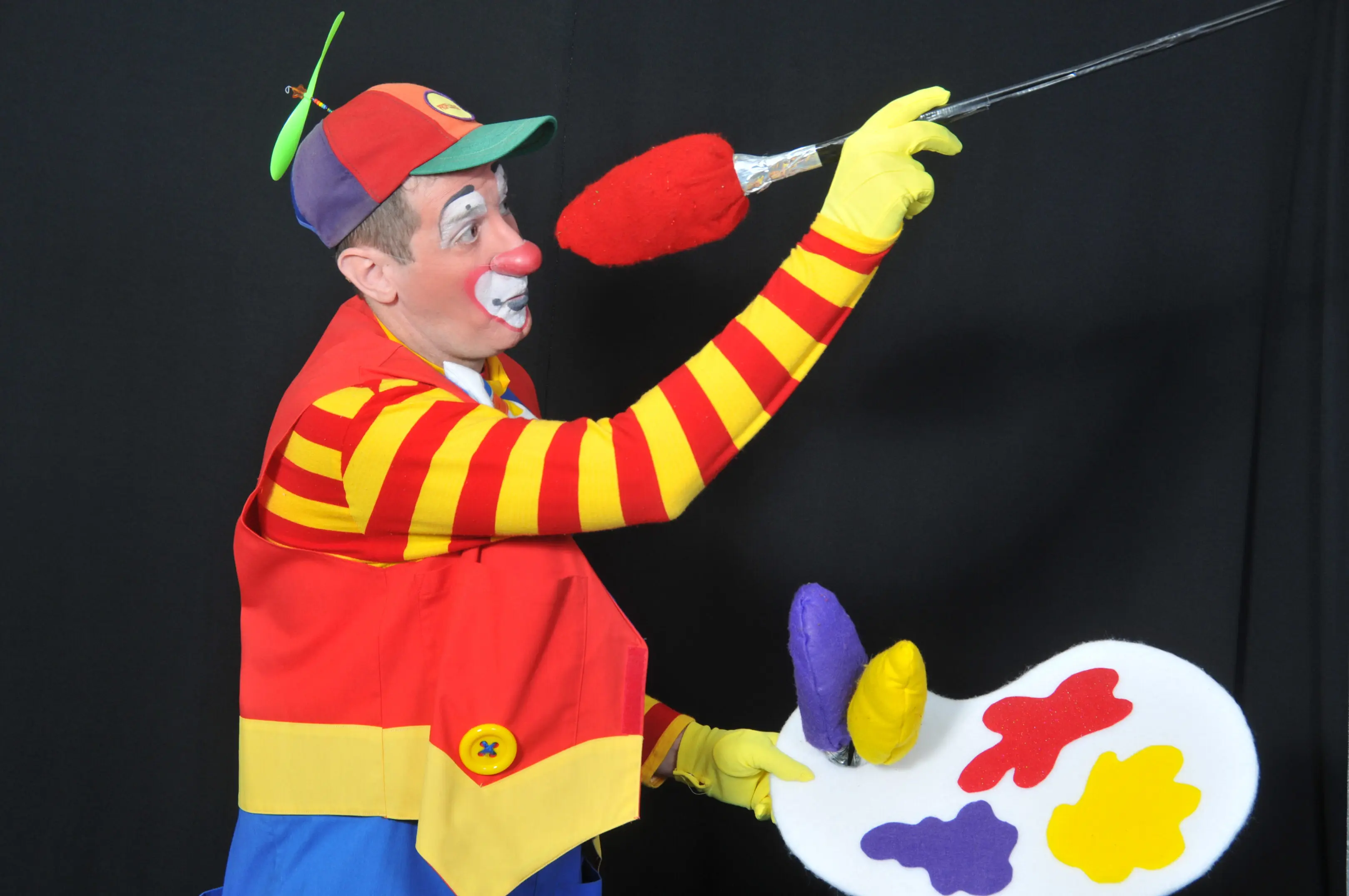 Clown artist in bright costume