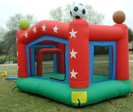 Star-decorated inflatable playhouse on grass